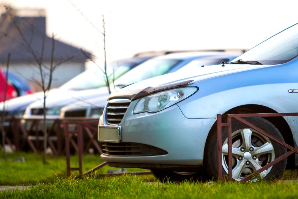 Cars parked on a parking lot in city